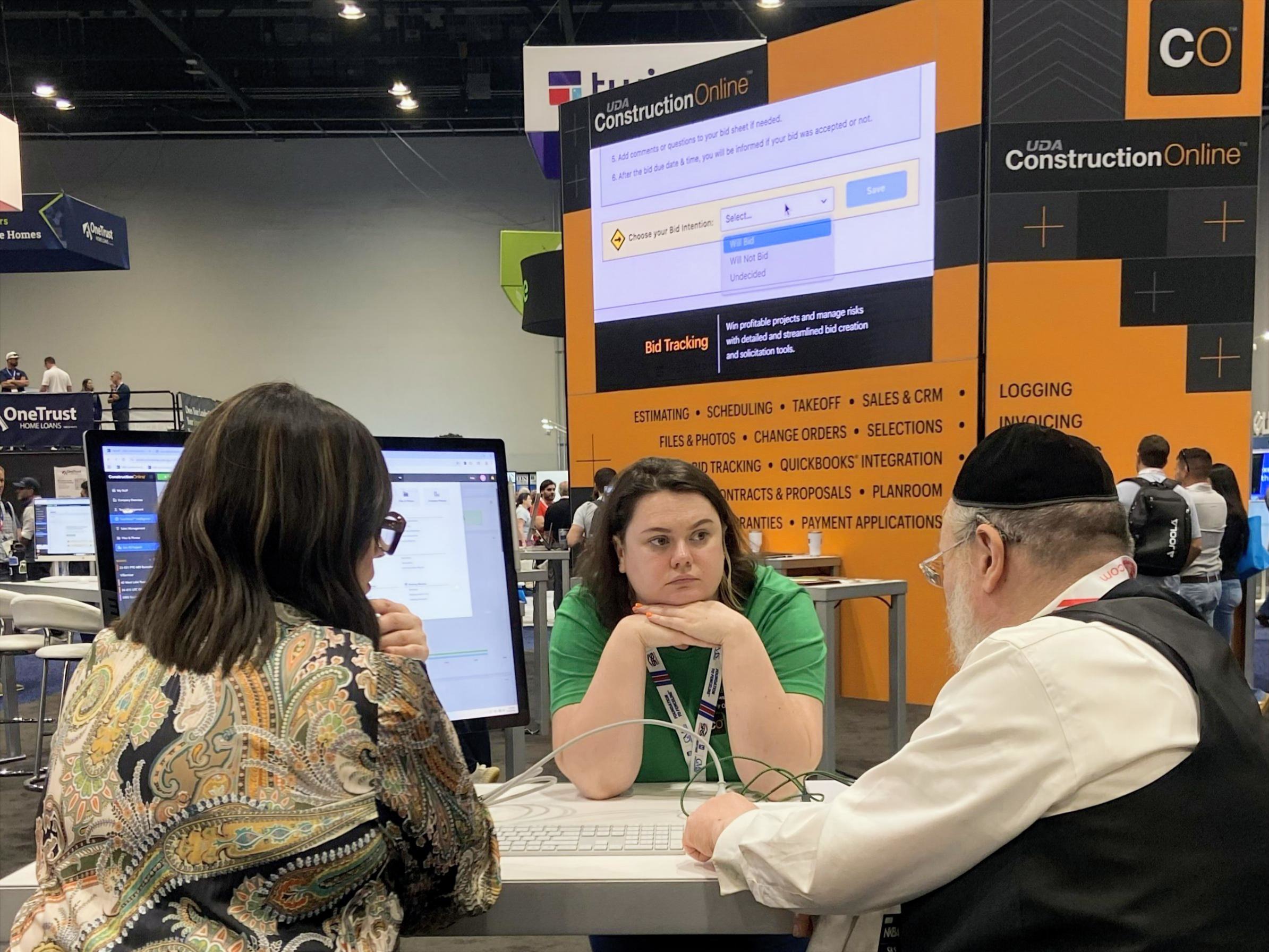Carly Orlando, Customer Success Manager for UDA ConstructionOnline, meets with existing clients and new referrals at the 2026 International Builders' Show in Orlando, Florida